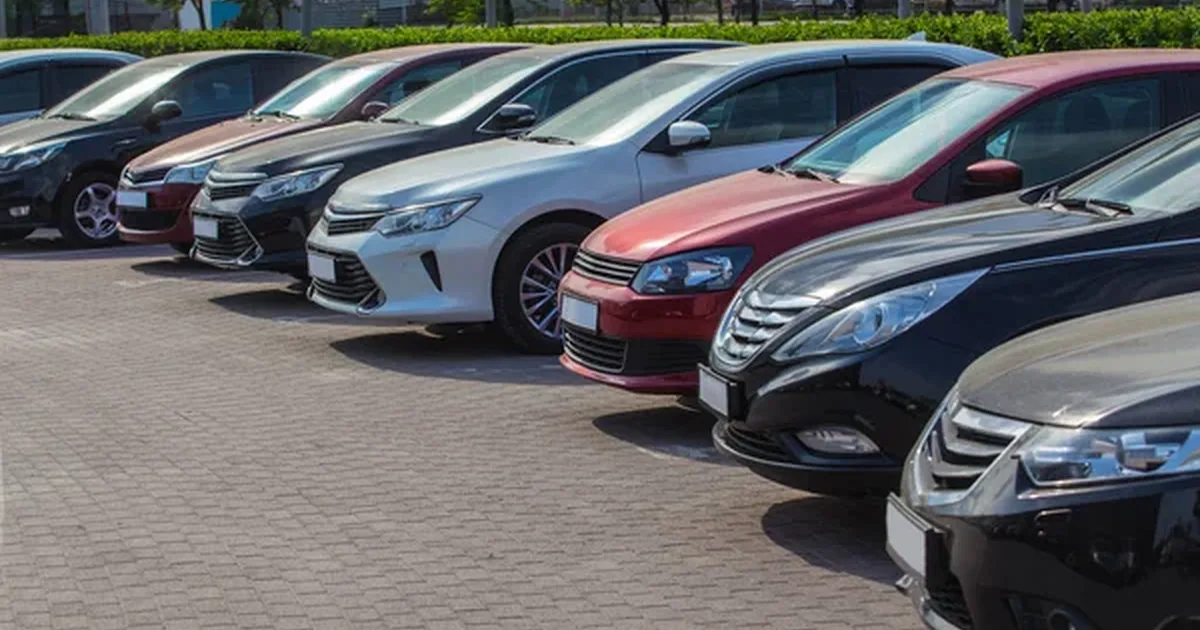 auctioned cars in a line